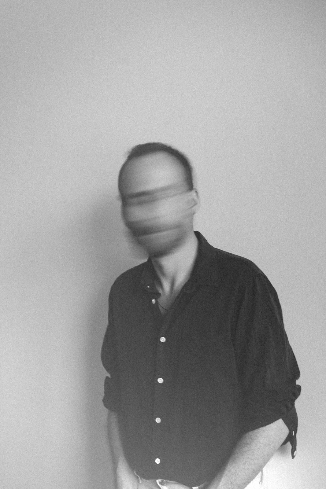 Piotr Kurek, portrait with motion blur, black and white