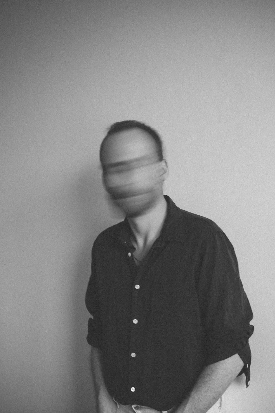 Piotr Kurek, portrait with motion blur, black and white